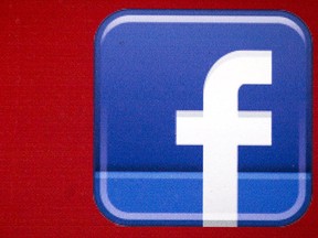 A Facebook logo is displayed on the side of a tour bus in New York's financial district July 28, 2015. REUTERS/Brendan McDermid