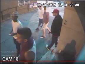 Security image from an alleged robbery on Aug. 21, 2015 near Bloor St. W. and Spadina Ave. Toronto Police released the video on Aug. 27, 2015.
