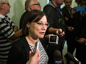 Environment Minister Shannon Phillips hosted U.S. Senator and presidential candidate Lindsey Graham, U.S. Senator Sheldon Whitehouse and Congressman Tom Rice for a tour of Suncor’s oilsands mining operations near Fort McMurray on Thursday. (CODIE MCLACHLAN/Edmonton Sun)