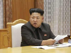 North Korean leader Kim Jong Un speaks at an emergency meeting of the Workers' Party of Korea (WPK) Central Military Commission, in this undated photo released by North Korea's Korean Central News Agency (KCNA) in Pyongyang on August 21, 2015.  REUTERS/KCNA