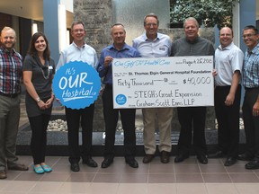 Graham Scott Enns LLP this week pledged a $40,000 contribution to the Great Expansion at St. Thomas Elgin General Hospital. Pictured from left - Paul Jenkins, executive director, STEGH Foundation; Melanie Taylor, chairwoman, STEGH board of governors; and  Graham Scott Enns partners Jim Frederick; Alan Enns; Bill Graham, managing partner; John Scott; Rob Foster; and Mike MacKinnon.