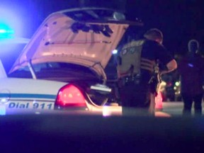 In this frame grab from video provided by WTOC-TV, authorities respond to a shooting at Savannah State University, late Thursday, Aug. 27, 2015, in Savannah, Ga. Authorities said a student was killed. (WTOC-TV via AP)