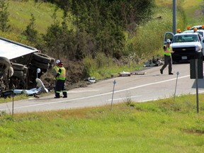 A tractor-trailer roll-over closed the westbound County Road 10 exit to Deseronto Road near Deseronto, Ont. on Friday August 28, 2015. Steph Crosier/Kingston Whig-Standard/Postmedia Network