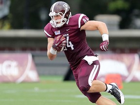 Dan Light, seen here in action with Fordham in 2014, was signed by the Denver Broncos on Friday, Aug. 28, 2015. (Gregory Payan/AP Photo/Files)