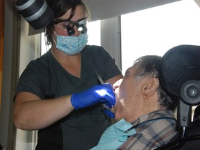 JESSICA LAWS/FOR THE INTELLIGENCER
Dental hygienist Leslie Bronson provides in-home dental care for patients who have mobility issues or are in long-term care homes like Moira Place in Tweed.