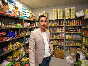 Alex Benac, the VP Internal for the University Students council at Western talks about their food bank as a tangible example of helping students at university  in London, Ont. on Thursday August 27, 2015. (MIKE HENSEN, The London Free Press)
