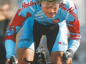Canada's Eric Wohlberg powers his way down the course in the elite men time trials event at the World Road Cycling Championships in Hamilton, Ontario, Thursday, Oct. 9, 2003. Wohlberg placed 25th in the event won by Great Britain's David Millar Ryan Remiorz/Canadian Press