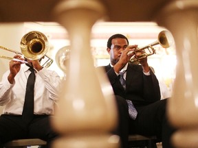 NEW ORLEANS, LA - AUGUST 28: Members of the Treme Brass Band play during a 'Katrina Concert' at the historically black St. Augustine Catholic Church on August 28, 2015 in New Orleans, Louisiana. The 10th anniversary of Hurricane Katrina is August 29.