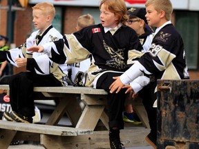 Dozens of local hockey players took part in Saturday morning's parade, to kick off the Hockey Heritage Day, on Saturday August 29, 2015 in Trenton, Ont. Emily Mountney-Lessard/Belleville Intelligencer/Postmedia Network