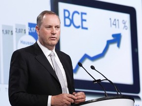 President and Chief Executive of Bell Canada Enterprises (BCE) George Cope speaks during the annual general shareholders meeting in Quebec City in this file photo taken May 3, 2012.  Canada's largest telecom company, BCE Inc, said on Wednesday it will pay C$3.95 billion ($3.68 billion) to take regional telecom Bell Aliant private, buying the 56 percent stake it does not already own to cut expenses and bolster its offerings in Atlantic Canada.  REUTERS/Mathieu Belanger/Files