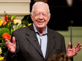 FILE - In this Aug. 23, 2015 file photo, former President Jimmy Carter teaches Sunday School class at Maranatha Baptist Church in his hometown  in Plains, Ga.  Carter’s recent diagnosis that cancer has spread to his brain will require him to scale back his work, but Carter Center officials say their programs will continue uninterrupted.  (AP Photo/David Goldman)