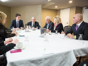 A picture posted to Liberal Leader Justin Trudeau's Flickr photo page, showing him next to Oakville Mayor Rob Burton at the head of the table during a meeting with 905-area politicians on Feb. 23, 2015. (Flickr/Justin Trudeau)