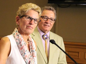 Ontario Premier Kathleen Wynne tackles media questions on teacher negotiations, high occupancy toll (HOT) lanes and her involvement in federal campaign on Aug. 24, 2015. (Antonella Artuso/Toronto Sun)