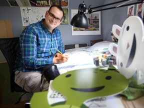 Artist Jason Blower at work in his south side studio in Edmonton, Alberta on August 29, 2015. Blower is trying to fund Hello#YEG'; An Edmonton Activity book though Kickstarter. Perry Mah/Edmonton Sun