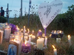 More than 100 people attended a candle light vigil for Kyle Melo and Kayla DeMelo, a London couple killed when their motorcycle collided with a pickup truck Friday night. JANE SIMS / THE LONDON FREE PRESS