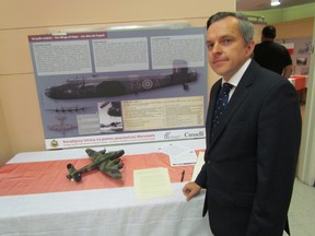 Andrzej Szydlo, consulate general of the Republic of Poland in Toronto, is shown on Saturday August 29, 2015 in Sarnia, Ont., attending an event held in conjunction with an exhibit, Canadian Aviators Help Warsaw During the Uprising '44, at the Sarnia Library. Paul Morden/Sarnia Observer/Postmedia Network