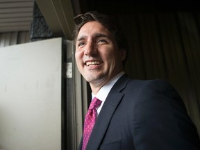 Federal Liberal Leader Justin Trudeau makes his way to the exit after  attending the Ahmadiyya Muslim Jama'at Conference in  Mississauga , Ontario, as he continues his campaigning in Canada's Federal Election on Saturday  August 28, 2015. THE CANADIAN PRESS/Chris Young