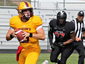 Queen’s University Quarterback Nate Hobbs plays an incredibly strong game for Gaels vs. Ottawa’s Carleton Ravens with Kingston Gael’s winning 34-24 in the OUA Football Season opener at Richardson Stadium in Kingston on Sunday, August 30th 2015. Kendra Pierroz, Whig-Standard / Postmedia Network