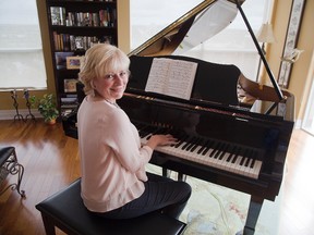 Cancer survivor and professional conductor Janet Heerema has organized a choir of 170 people to perform in the Ovarian Cancer Research Funding Concert at Centennial Hall in November. (DEREK RUTTAN, The London Free Press)
