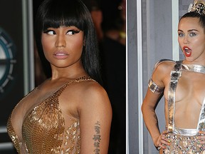 Nicki Minaj, left, and Miley Cyrus are pictured at the 2015 MTV Video Music Awards in Los Angeles, Calif., on Aug. 30, 2015. (WENN.COM Photos)