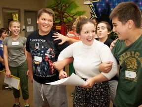 Munchkin Josh Gibson, left, joins Wizard of Oz director Maddisyn Fisher, centre, and munchkin Nate Paquette in rehearsal for Rebound Act IIís production of The Wizard of Oz, running Sept 17-19 at the Imperial Theatre in Sarnia.
Handout/Sarnia Observer/Postmedia Network