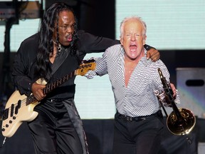 Verdine White of Earth, Wind & Fire, left, and James Pankow of Chicago perform at the Heart and Soul Tour at The Forum on Saturday, July 18, 2015, in Inglewood, Calif. (Photo by Rich Fury/Invision/AP)
