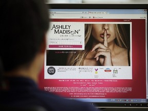 A June 10, 2015 file photo shows Ashley Madison's Korean website on a computer screen in Seoul, South Korea. (AP Photo/Lee Jin-man, File)