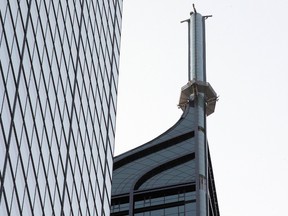 Police closed Bay St. between Richmond and King Sts. after a report of an "unstable antenna" on the Trump Tower in Toronto on Monday August 31, 2015. (Dave Abel/Toronto Sun)