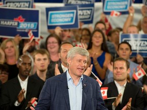Conservative leader Stephen Harper speaks to supporters during a campaign stop in Ottawa, on Aug. 31, 2015. (THE CANADIAN PRESS/Adrian Wyld)