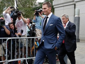 New England Patriots quarterback Tom Brady leaves Federal court in New York, Monday, Aug. 31, 2015.(AP Photo/Richard Drew)