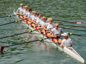 Team Canada with cox Lesley Thompson-Willie, Lauren Wilkinson, Christine Roper, Ashley Brzozowicz, Natalie Mastracci, Jennifer Martins, Susanne Grainger, Lisa Roman and Cristy Nurse, from right,  on their way to win  the Women eight Final at the Rowing World Cup on Lake Rotsee in this file photo from Lucerne, Switzerland, July 12, 2015.