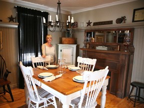 Laura McLean shows off her dining room. Her quaint home spans over a century and features many repurposed items. Gino Donato/The Sudbury Star/Postmedia Network