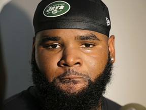 New York Jets defensive end Sheldon Richardson responds to questions during a news interview after practice at training camp in Florham Park, N.J. Richardson will be back in court in Missouri on Oct. 5 after pleading not guilty to resisting arrest and traffic charges. (AP Photo/Frank Franklin II, File)