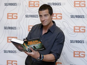In this June 4, 2015 file photo, British writer and TV presenter Bear Grylls poses for photographers before signing copies of his new book at Selfridges in London. The survival expert Grylls has bagged his biggest celebrity yet for a walk in the wilderness — President Barack Obama. NBC and the White House said Monday, Aug. 31, 2015, the president will meet with Grylls during his visit to Alaska. (AP Photo/Tim Ireland, File)