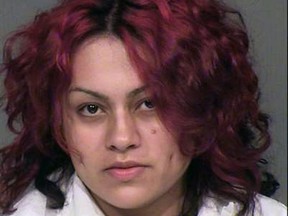 This undated booking photo provided by the Maricopa County Sheriff shows Mireya Alejandra Lopez who was arrested Sunday, Aug. 30, 2015 at a home in Avondale, Ariz. She is accused of drowning her 2-year-old twin sons and attempting to drown a third son. She is jailed on two counts of first-degree murder and one count of attempted murder, with bail set at US$2 million. (Maricopa County Sheriff via AP)
