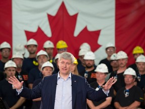 Conservative leader Stephen Harper speaks during a campaign stop at a steel manufacturer in Burlington, Ont., on Sept. 1, 2015. (THE CANADIAN PRESS/Adrian Wyld)