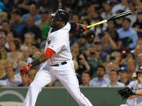 Boston Red Sox designated hitter David Ortiz hits his career 495th home run during the fourth inning against the New York Yankees at Fenway Park. (Bob DeChiara/USA TODAY Sports)