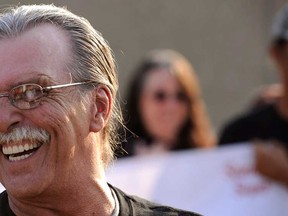 Jeff Mizanskey, left, speaks after being released from the Jefferson City Correctional Center, after serving two decades of a life sentence for a marijuana-related charge in Jefferson City, Mo., on Tuesday, Sept. 1, 2015.  His release followed years of lobbying by relatives, lawmakers and others who argued that the sentence was too stiff and that marijuana should not be forbidden.  (AP Photo/Columbia Missourian/Justin L. Stewart)