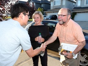 Premier Rachel Notley was door-knocking with NDP candidate Bob Hawkesworth in the Calgary-Foothills community of Kincora as they speak to Sung Bang in Calgary on Wednesday August 19, 2015. Darren Makowichuk/Calgary Sun/Postmedia NetworkCalgary police use a drone to investigate a fatal collision between a van and a tanker truck on Stoney Trail near Shaganappi Trail in Calgary on Wednesday August 19, 2015. Darren Makowichuk/Calgary Sun/Postmedia Network