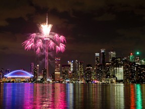 Fireworks explode over the Toronto skyline, during the opening ceremony for the Pan Am Games in Toronto, Friday, July 10, 2015. (AP Photo/Rebecca Blackwell)