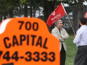 Taxi drivers picket their head quarters on Coventry Road in Ottawa Ontario Monday Sept 1, 2015.   Tony Caldwell/Ottawa Sun/Postmedia Network