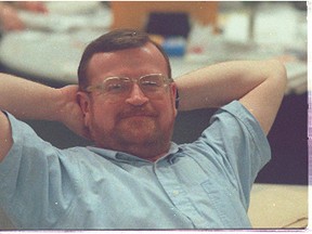 Former editor Bill Duff is pictured at his work station in the Toronto Sun newsroom in the early 1990s. (IAN ROBERTSON PHOTO)