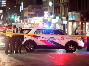 Police at the scene on Yonge between Wellesley and Maitland after a man died in custody Tuesday, Sept. 1, 2015. (John Hanley photo)