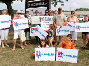 A small group of protesters opposed to the new sex-ed curriculum being implement when school starts next week gathered at the office of Chatham-Kent Essex MPP Rick Nicholls in Chatham, Ont. on Tuesday September 1, 2015. (Ellwood Shreve/Chatham Daily News/Postmedia Network)