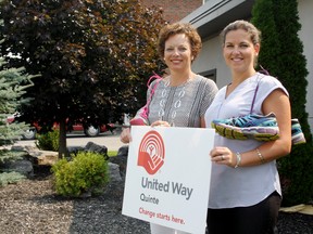 Sarah Hyatt/The Intelligencer
Executive director Judi Gilbert (left) and Lyndsey Harker, resource support co-ordinator, outside United Way of Quinte in Belleville Wednesday, September 2, 2015. The pair are encouraging families and community members to take part in United Way's 2015 Campaign Launch and Run for Change on Sept. 13.