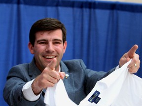 Mayor Don Iveson gets the crowd into a cheer during the announcement for the bid on the 2022 Commonwealth Games during a news conference at city hall in Edmonton on Monday July 1, 2014. (Perry Mah/Edmonton Sun file)