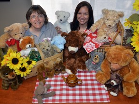 Jackie Ralph, left, and April Robinson, with some of the stuffed animals that were out during the first annual Teddy Bear Picnic last year. Sun Times files