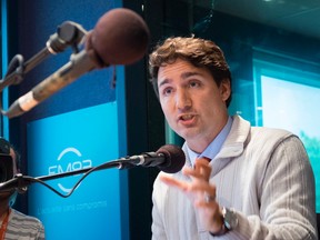 Liberal leader Justin Trudeau responds to a question during a live radio interview Wednesday, September 2, 2015 in Quebec City. THE CANADIAN PRESS/Paul Chiasson