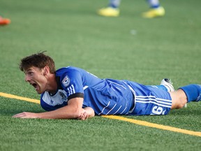 Edmonton's Daryl Fordyce reacts to a hit during a NASL soccer game between FC Edmonton and the Indy Eleven at Clarke Stadium in Edmonton, Alta., on Wednesday August 5, 2015. Ian Kucerak/Edmonton Sun/Postmedia Network