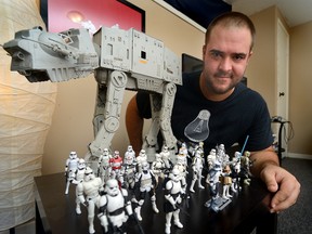 Star Wars collector Matt Ker of London shows off his army of Stormtroopers. (MORRIS LAMONT, The London Free Press)